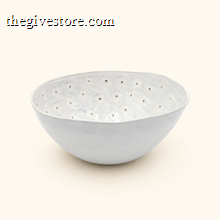 White ceramic bowl with floral pattern on a white background