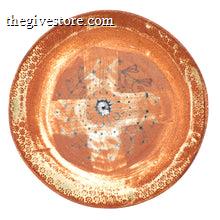 Ceramic plate with decorative patterns on a white background