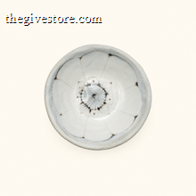 Spako Clay ceramic dish with floral pattern on a white background