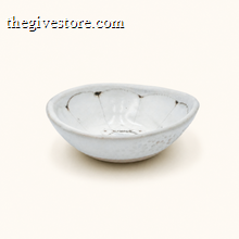 Spako Clay ceramic dish with floral pattern on a white background