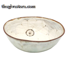 Ceramic bowl with a textured surface on a white background