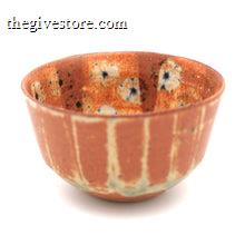 Ceramic bowl with floral patterns on a white background
