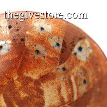 Ceramic bowl with floral design on a white background