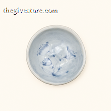 Spako Clay ceramic dish with blue floral pattern on a white background