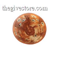 Round ceramic bowl with brown and blue floral pattern on a white background