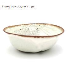 Ceramic bowl with a textured surface on a white background