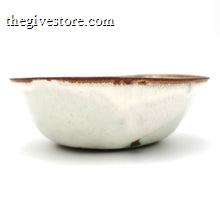 White ceramic bowl with brown rim on a white background