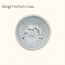 Spako Clay ceramic dish with floral pattern on a white background