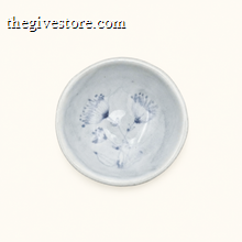 Spako Clay ceramic dish with blue floral pattern on a white background