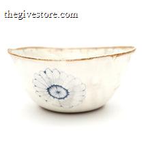 White ceramic bowl with blue floral design on a white background