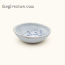 Ceramic bowl with blue floral patterns on a white background