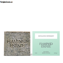 Bar of soap and its packaging with 'Flamingo Estate' branding on a white background