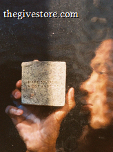 Person holding a Flamingo Estate Exfoliating Peppermint Organic Bar Soap 